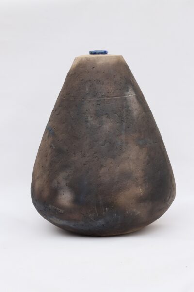 Bottle with a stone